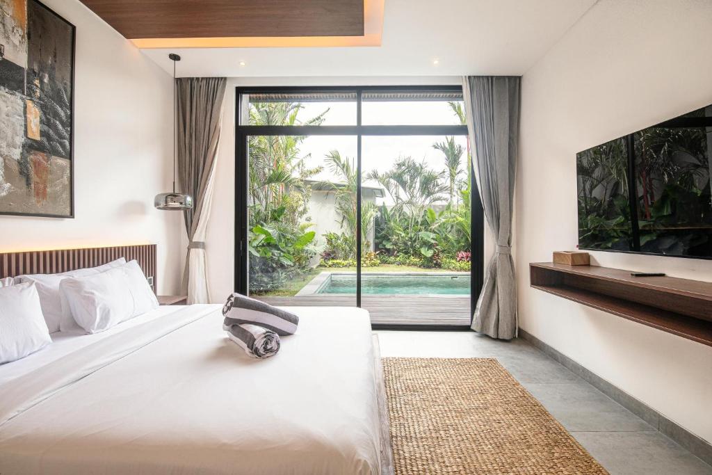 Exquisite 5BR Canggu Villa Steps from the Beach Exquisite 5BR Canggu Villa Steps from the Beach