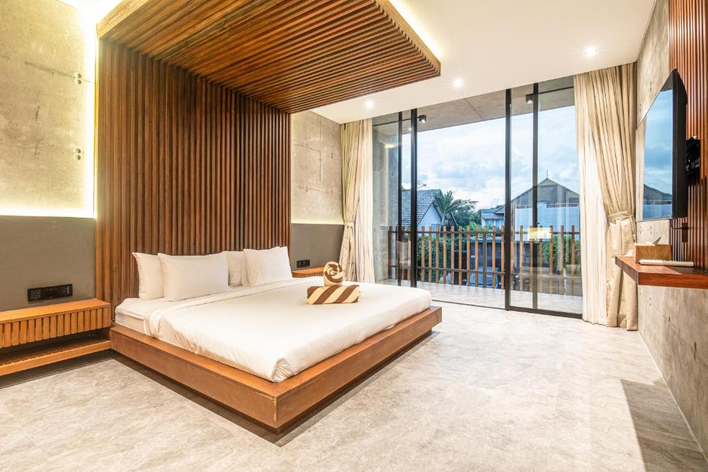 Modern 4BR Canggu Retreat Just 8mins to the Beach Modern 4BR Canggu Retreat Just 8mins to the Beach