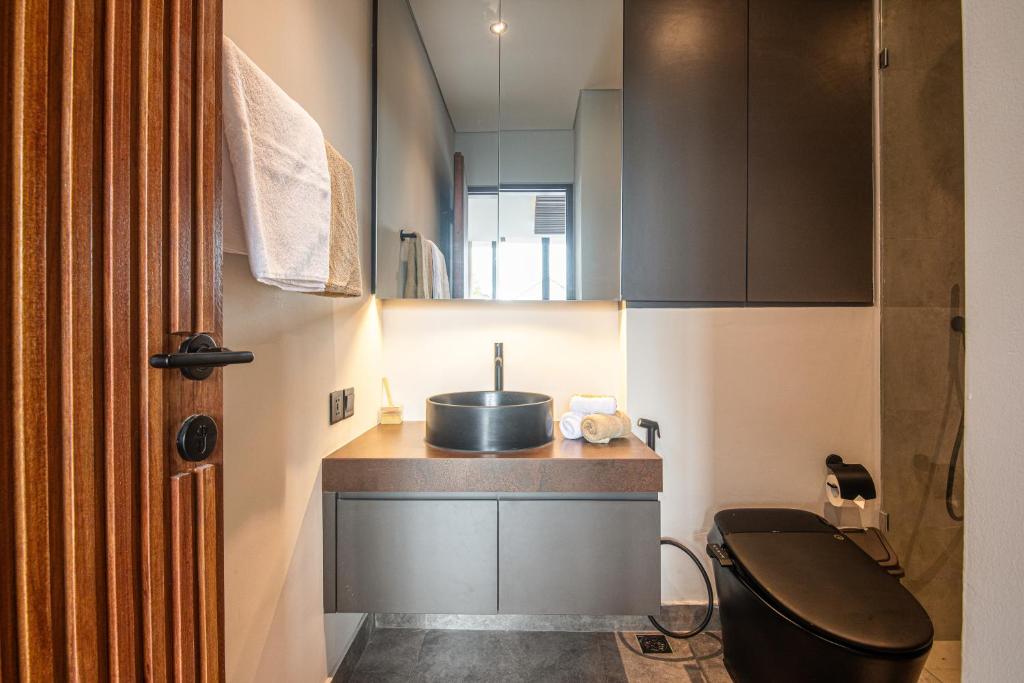 Modern 4BR Canggu Retreat Just 8mins to the Beach Modern 4BR Canggu Retreat Just 8mins to the Beach